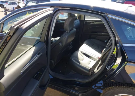 2016 Ford Fusion Energi Titanium from USA, damaged, VIN 3FA6P0SU1GR320885